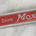 Lot 034 - Vintage Slide Up Bottle Opener Advertising Moxie Soda, "Frank Archer Invites You To Visit Moxie Land, The Home Of Moxie, Drink Moxie 100%" Marked Patent Pending