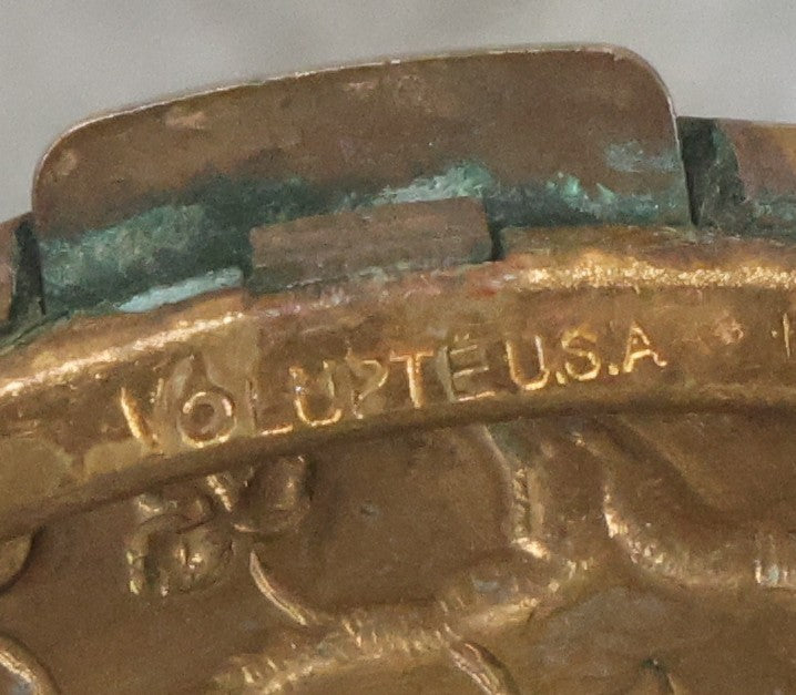 Lot 037 - Antique Oval Shaped Brass Pill Box With Hinged Lid With Bird And Grapes Motif, Marked Volupte, U.S.A.