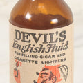 Lot 040 - Vintage Devil's English Fluid Lighter Fluid Bottle With Original Paper Label, Empty, By Devil Laboratories Co., Cincinnati Ohio, 15 Cent Size
