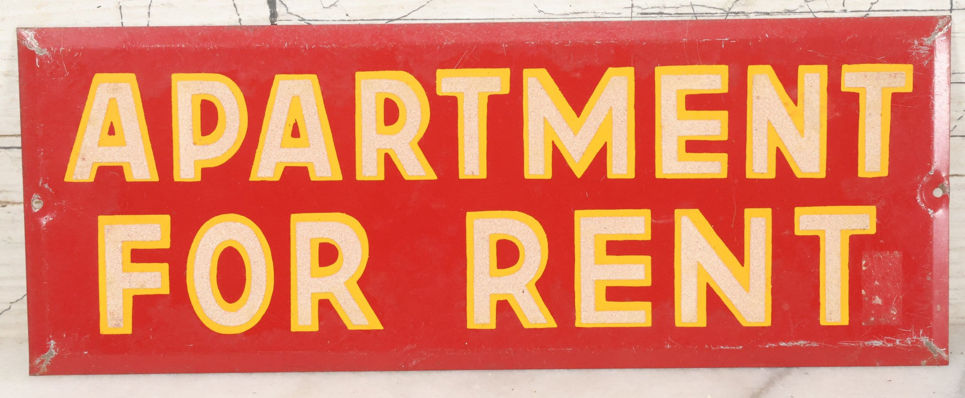 Lot 024 - Vintage Red Apartment For Rent Tin Tacker Sign With Smaltz Lettering, White Letters With Yellow Outlines (A), 9-1/4" x 3-1/2"