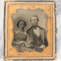Lot 056 - Antique 1/6th Plate Ambrotype Photograph Of Young Couple Including Man With Messy Beard, Both With Gold-Tinted Jewelry, In Split Half Leatherette Union Case