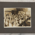 Lot 067 - Antique Boarded Interior Schoolroom Photograph Of Class Of Girls And Their Teacher (6th Grade), April 29, 1921, Partial Identification On Verso