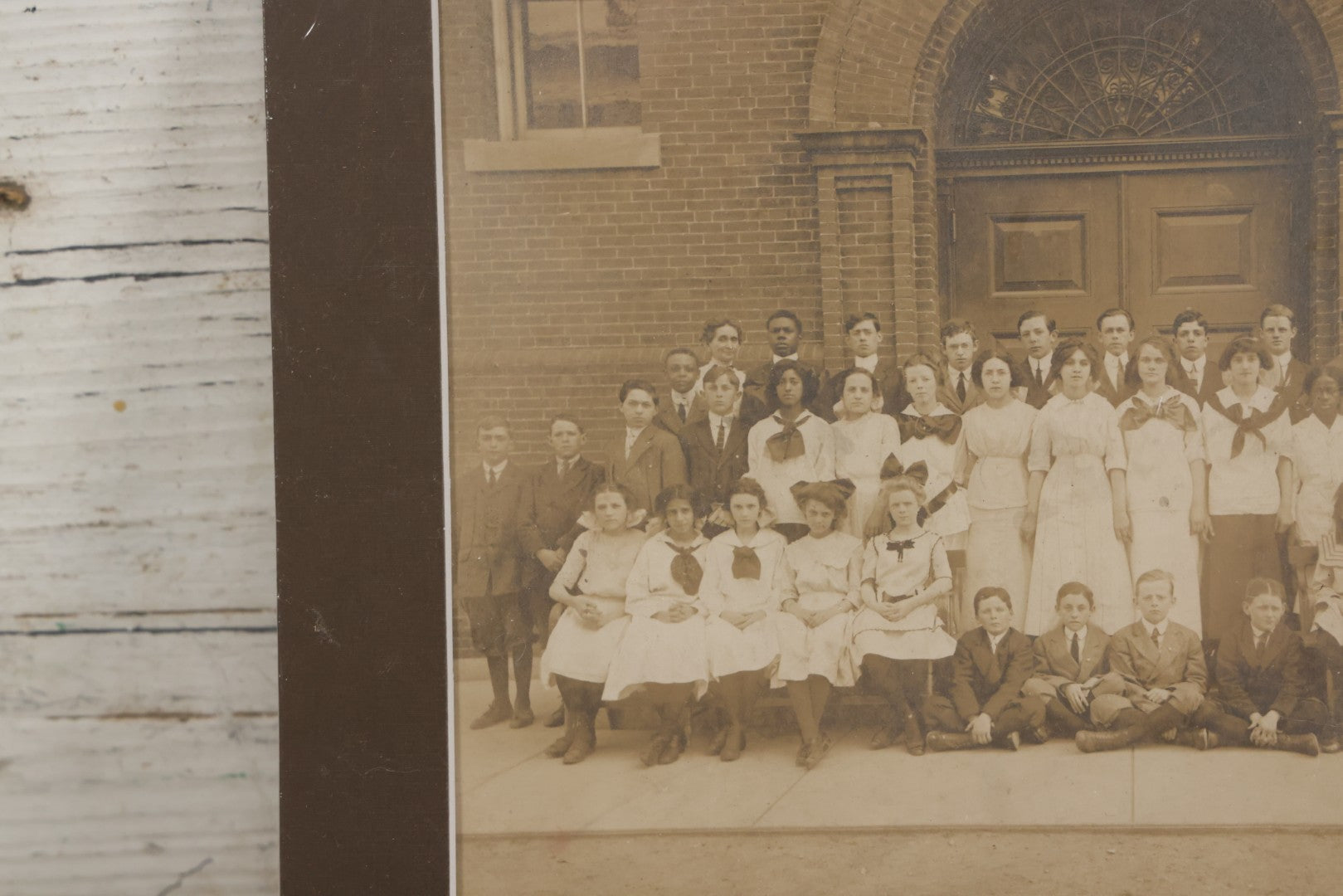 Lot 068 - Antique Photograph Of Schoolchildren, Interracial Class, Outside Of Brick Schoolhouse Including Many Young Girls And Boys And Teachers, Matted And Shrink Wrapped