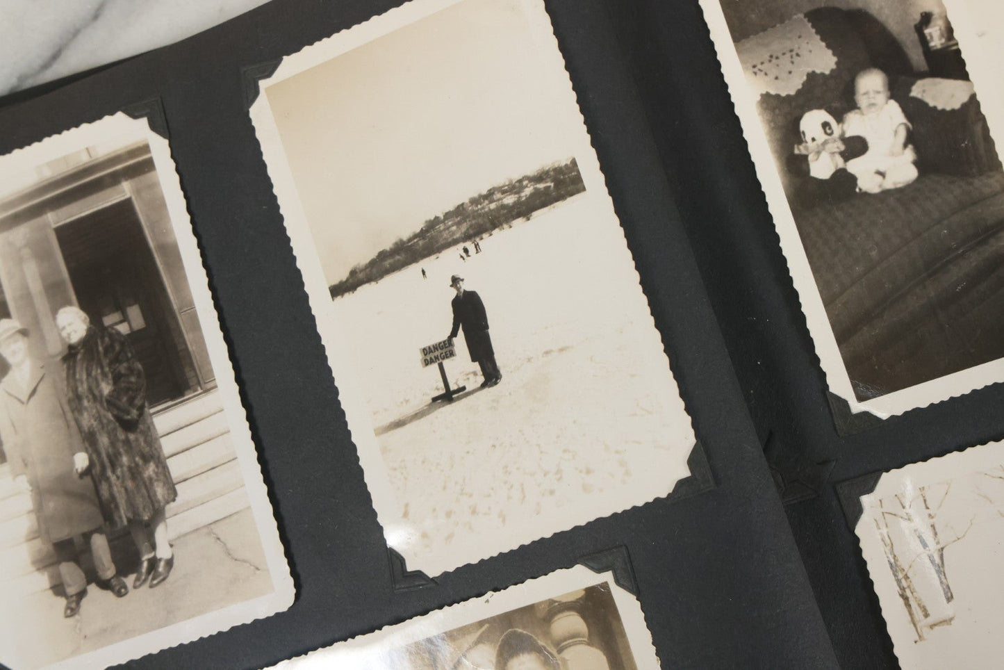 Lot 076 - Vintage Snapshot Photo Album Containing Mostly Photos Of Children And Family And Photos Of Times Square, New York City, Wedding Photos, With Pirate On Cover, Circa 1940s, Note Cover Detached, All Photos Pictured