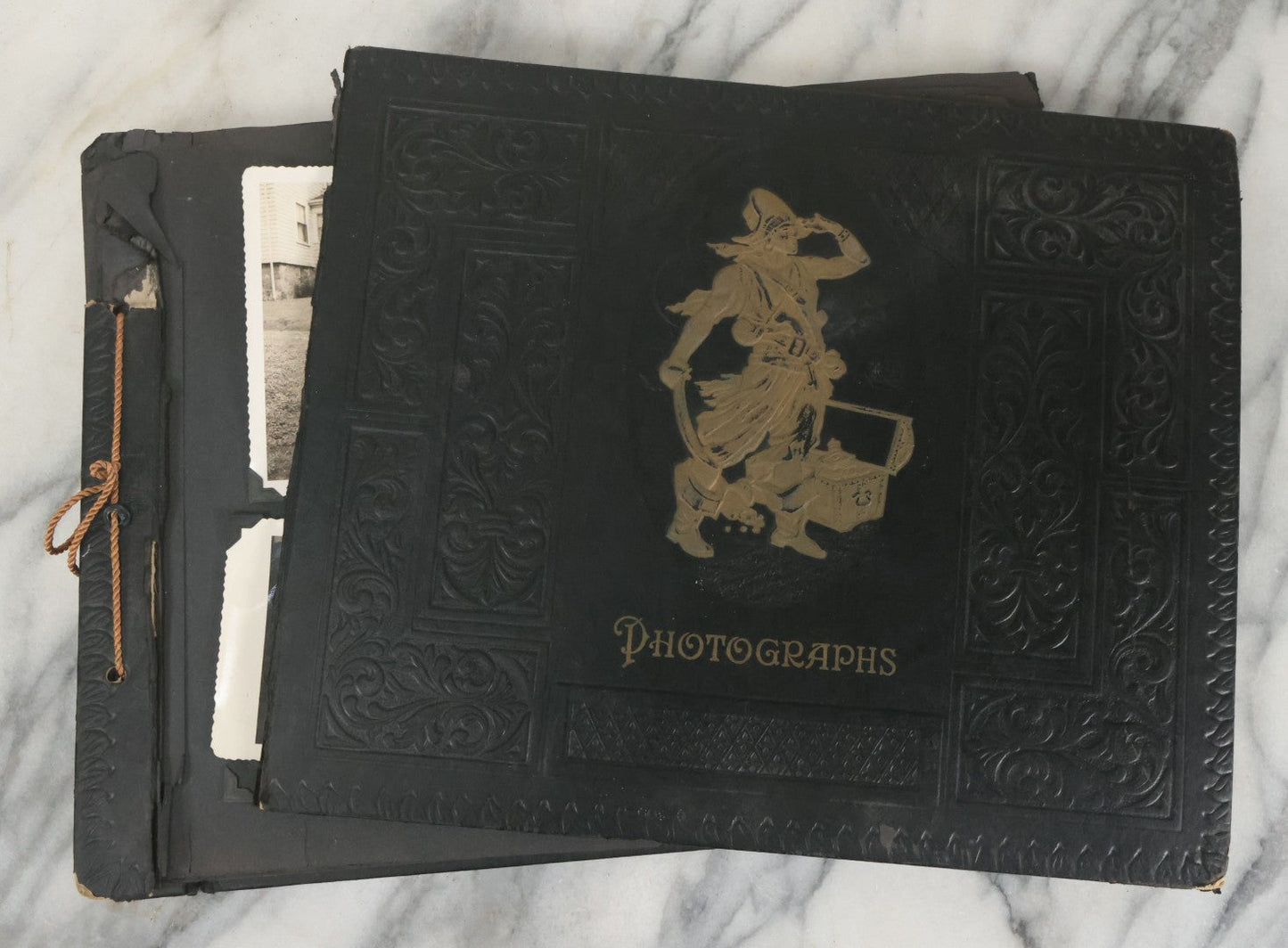 Lot 076 - Vintage Snapshot Photo Album Containing Mostly Photos Of Children And Family And Photos Of Times Square, New York City, Wedding Photos, With Pirate On Cover, Circa 1940s, Note Cover Detached, All Photos Pictured