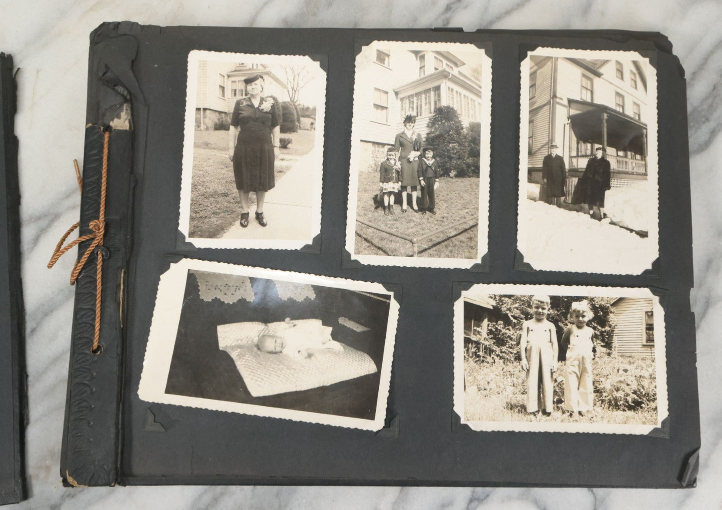 Lot 076 - Vintage Snapshot Photo Album Containing Mostly Photos Of Children And Family And Photos Of Times Square, New York City, Wedding Photos, With Pirate On Cover, Circa 1940s, Note Cover Detached, All Photos Pictured
