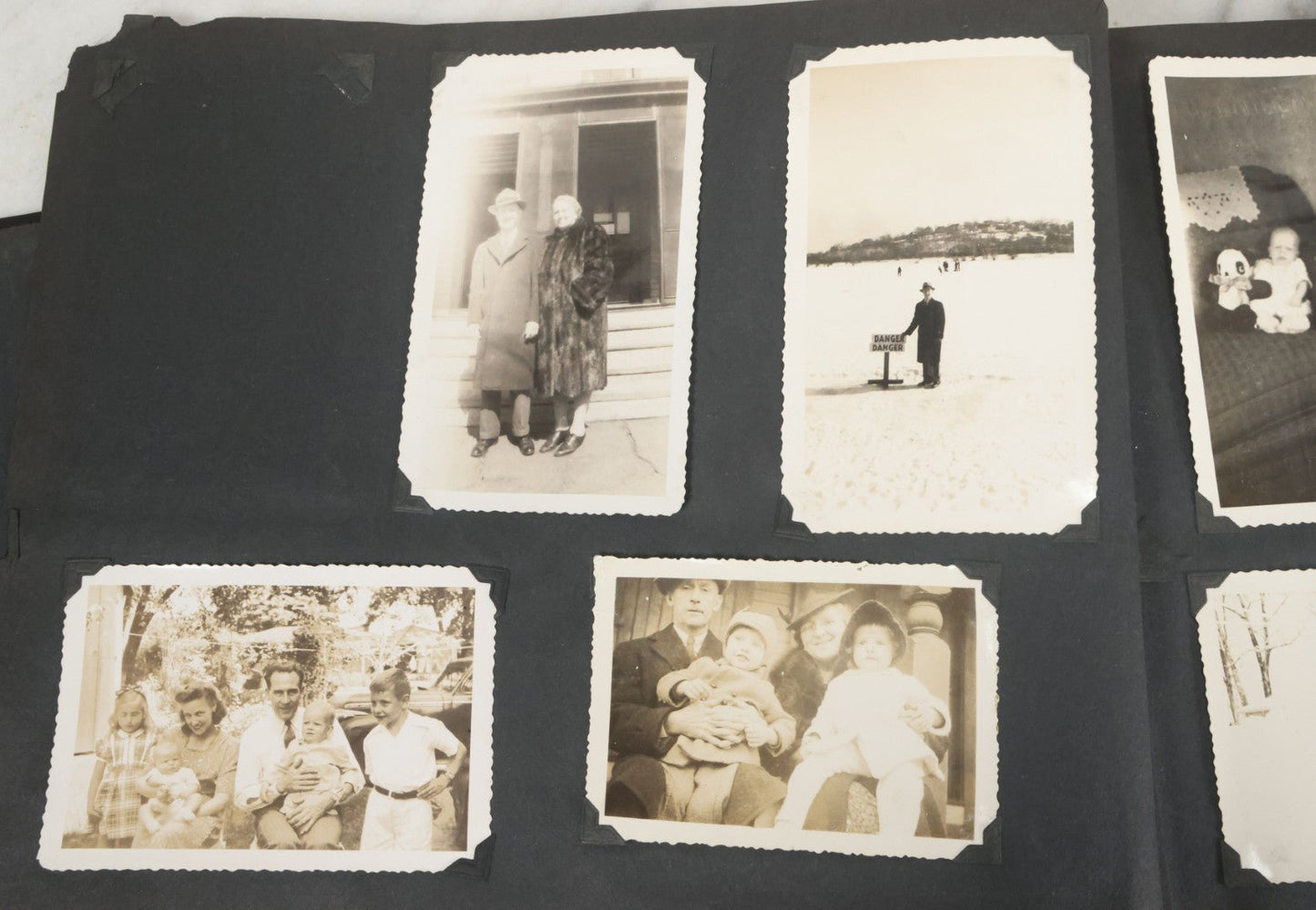 Lot 076 - Vintage Snapshot Photo Album Containing Mostly Photos Of Children And Family And Photos Of Times Square, New York City, Wedding Photos, With Pirate On Cover, Circa 1940s, Note Cover Detached, All Photos Pictured