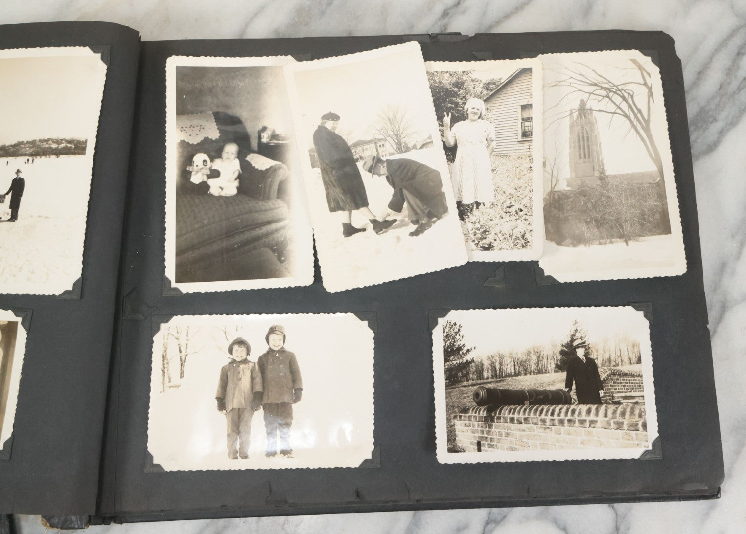 Lot 076 - Vintage Snapshot Photo Album Containing Mostly Photos Of Children And Family And Photos Of Times Square, New York City, Wedding Photos, With Pirate On Cover, Circa 1940s, Note Cover Detached, All Photos Pictured