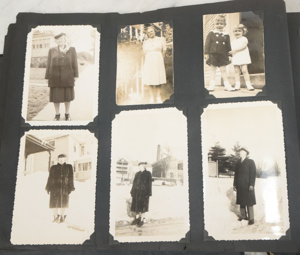 Lot 076 - Vintage Snapshot Photo Album Containing Mostly Photos Of Children And Family And Photos Of Times Square, New York City, Wedding Photos, With Pirate On Cover, Circa 1940s, Note Cover Detached, All Photos Pictured