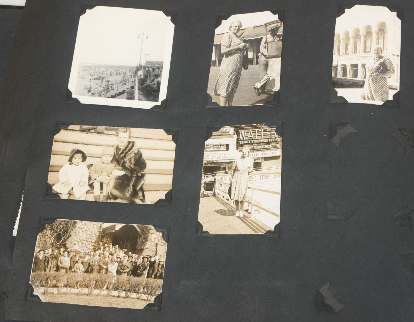 Lot 076 - Vintage Snapshot Photo Album Containing Mostly Photos Of Children And Family And Photos Of Times Square, New York City, Wedding Photos, With Pirate On Cover, Circa 1940s, Note Cover Detached, All Photos Pictured