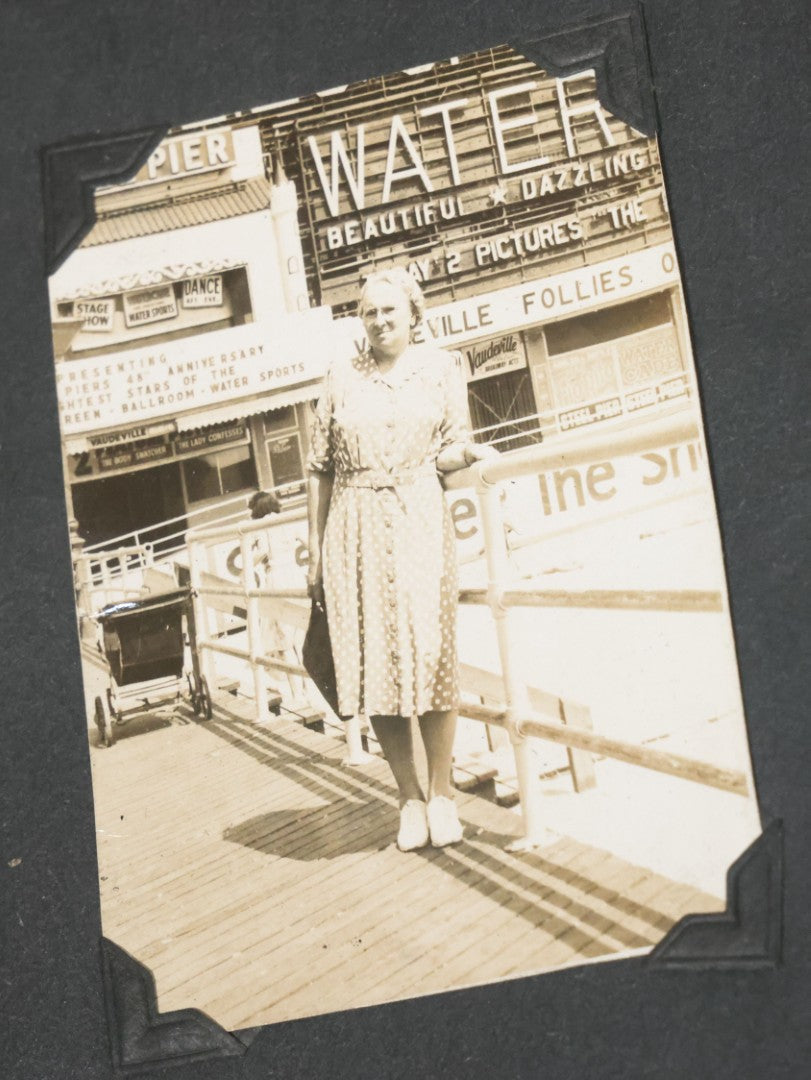 Lot 076 - Vintage Snapshot Photo Album Containing Mostly Photos Of Children And Family And Photos Of Times Square, New York City, Wedding Photos, With Pirate On Cover, Circa 1940s, Note Cover Detached, All Photos Pictured