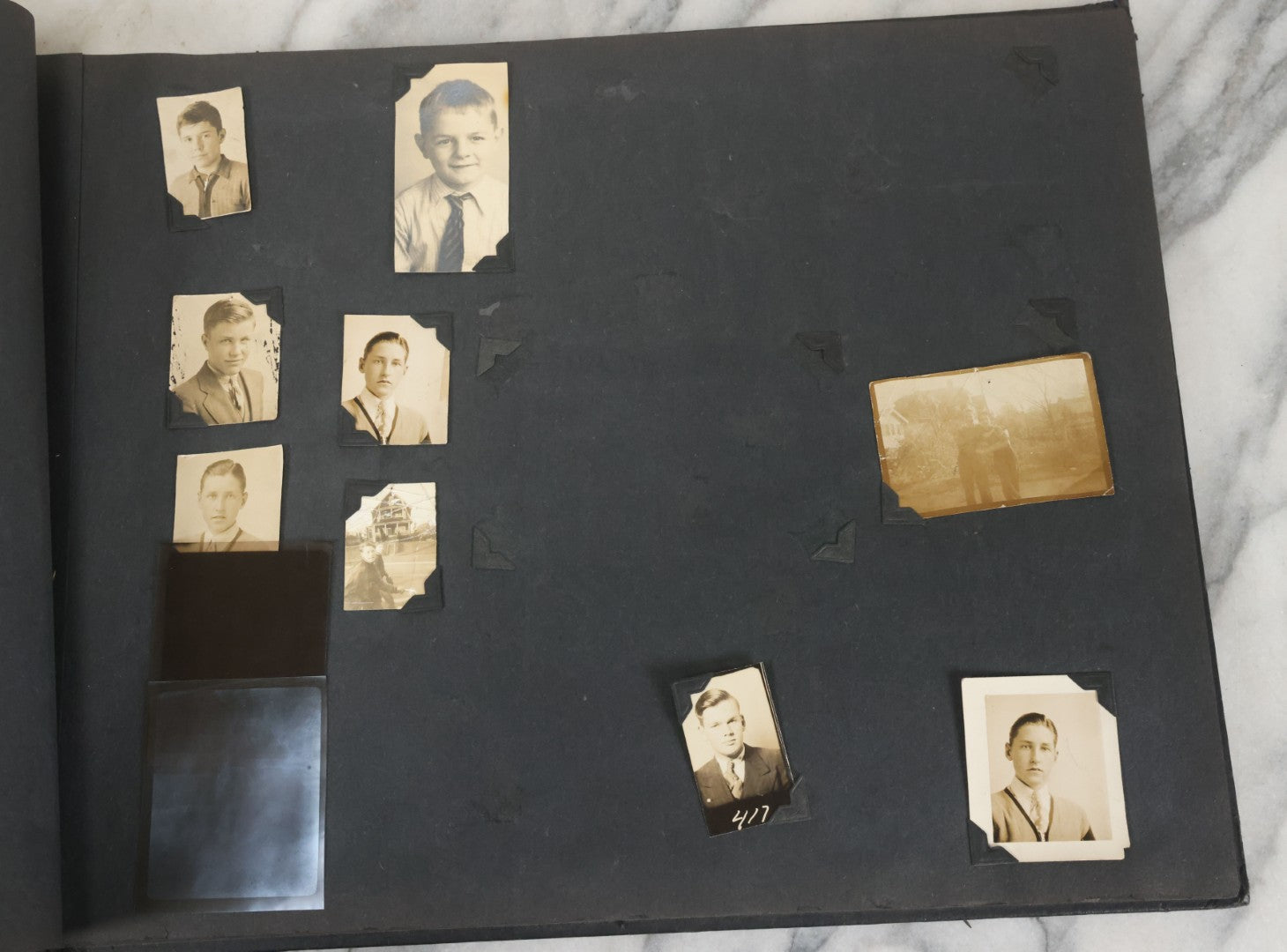 Lot 076 - Vintage Snapshot Photo Album Containing Mostly Photos Of Children And Family And Photos Of Times Square, New York City, Wedding Photos, With Pirate On Cover, Circa 1940s, Note Cover Detached, All Photos Pictured