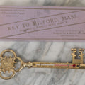 Lot 088 - Antique Brass Thermometer Key Souvenir, Key To Milford Massachusetts, Distributed By Cahills News Agency, Manufactured By Rudolph Toy & Novelty Co., Philadelphia, 24K Gold Plated, In Original Box