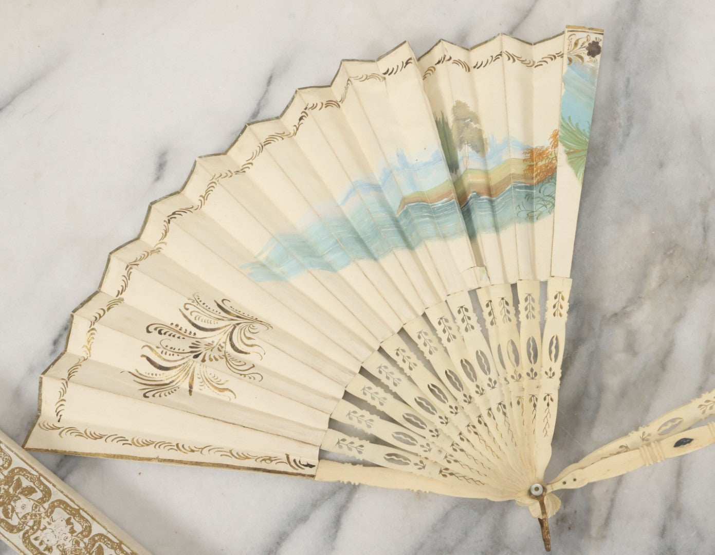 Lot 089 - Pair Of Antique Hand Fans Including Hand Painted In Original Box (Note, Vertical Tear In Fan), And Purple Maroon Pop Up Fan With Slide Mechanism