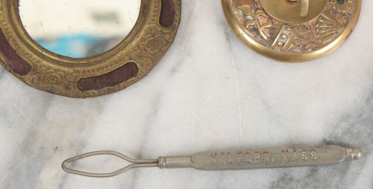 Lot 092 - Antique 3 Item Metal Grouping Including Miniature Pocket Mirror, Brass Doorbell Knob, And Advertising Button Hook For Reynolds' Shoe Store, Milford Massachusetts