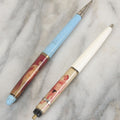 Lot 098 - Pair Of Vintage Pinup Nudie Pens Including Woman With Disappearing Dress And Two Men In Spandex, Note Pen With Men Missing Parts And Nude Effect Not Working, Pens Do Not Write