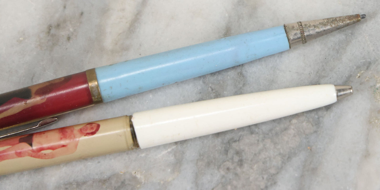 Lot 098 - Pair Of Vintage Pinup Nudie Pens Including Woman With Disappearing Dress And Two Men In Spandex, Note Pen With Men Missing Parts And Nude Effect Not Working, Pens Do Not Write