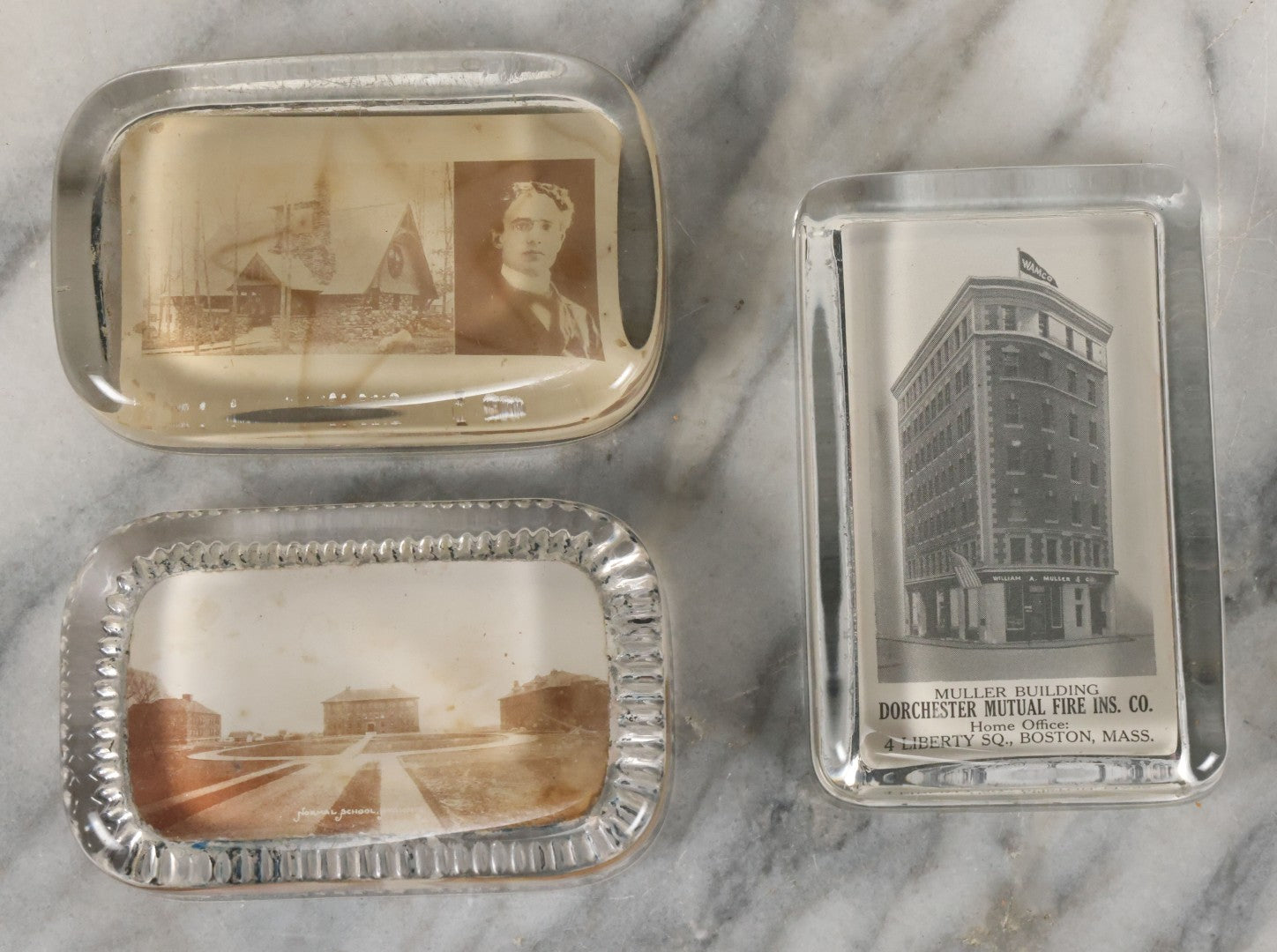 Lot 099 - Grouping Of 3 Antique Glass Paperweights Including Muller Building Dorchester Mutual Fire Insurance Company, Boston, Normal School, Hyannis, And Union Chapel Hopedale, Massachusetts