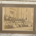 Lot 058 - Antique Boarded Photograph Of A High School Class Posing On The Steps Of Their School, Shrink Wrapped With Mat