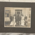 Lot 061 - Antique Boarded Photograph Of Several Generations Of A Family Posing Outside Of Their Home, With Pitbull Dog In Photo