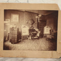 Lot 068 - Antique Boarded Interior Photograph Of The Living Room Of Charles And Elvira Boynton, With Photographs Of John Haines And Bertha Boynton Haines Displayed Along With Artwork, Instruments, Etc