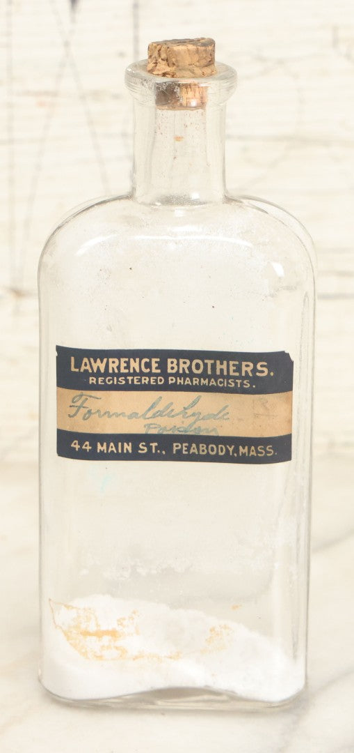 Lot 025 - Antique Lawrence Brothers Registered Pharmacists, Peabody, Massachusetts Glass Pharmacy Bottle With Handwritten Formaldehyde Poison Label