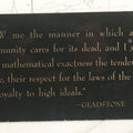 Lot 052 - Vintage Glass Funeral Home Display Sign With Quote From Gladstone, "Show Me The Manner In Which A Nation Or Community Cares For Its Dead," By Progressive Merchandisers Guild, Inc.
