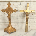 Lot 059 - Pair Of Cast Metal Gold Painted Crucifixes, One Free Standing On Base, One Wall Hanging
