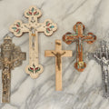 Lot 060 - Grouping Of Five Assorted Crucifixes Including Wood With Turquoise And Coral Compartments, Jerusalem Cross With Stones From The Holy Land, And Others