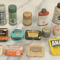 Lot 076 - Grouping Of 14 Pharmacy Tins (Smaller Size) Including Analax Chewies, Doan's Pills, And Vicks Vaporub