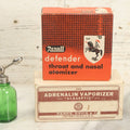 Lot 078 - Pair Of Vintage Medical Vaporizers In Original Boxes Including Adrenalin "Glaseptic" Vaporizer, And Rexall Defender Throat And Nasal Atomizer
