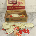 Lot 020 - Grouping Of Vintage Plastic Deli Meat And Cheese Price Tag Markers With Assorted Numbers And Symbols, In Cigar Box, As Found