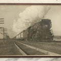 Lot 035 - Vintage Framed Glossy Photograph Of A Railroad Locomotive Train Alongside Power Lines, Circa 1920, In Frame
