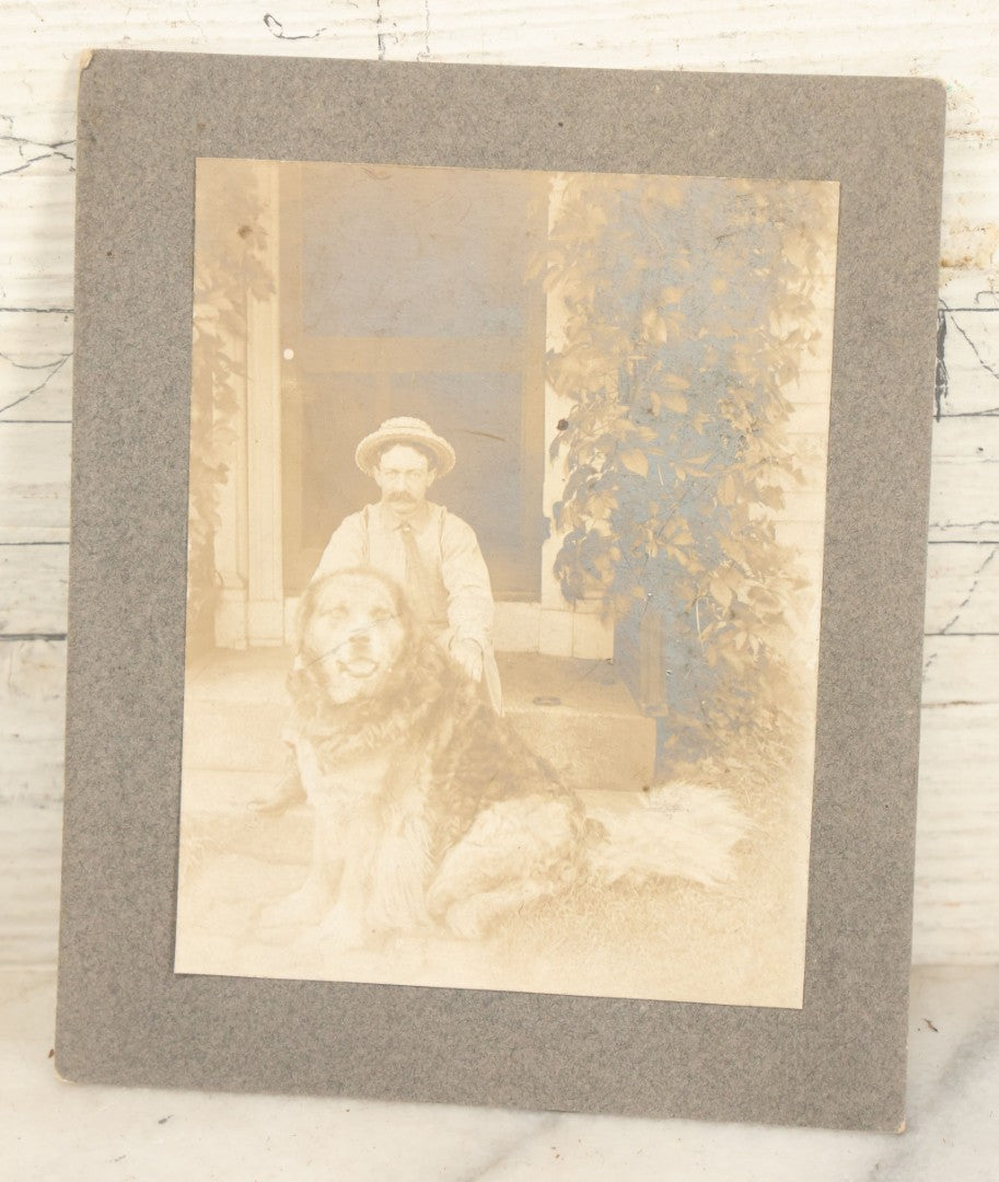 Lot 095 - Antique Boarded Photograph Of A Man Sitting On His Stoop With His Giant Dog