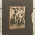 Lot 098 - Antique Boarded Photograph Of Friends Goofing Off, Smoking Pipes, Two Women And Five Men, Titled "The Degenerates" On Verso, Note Loss To Right Side Of Board
