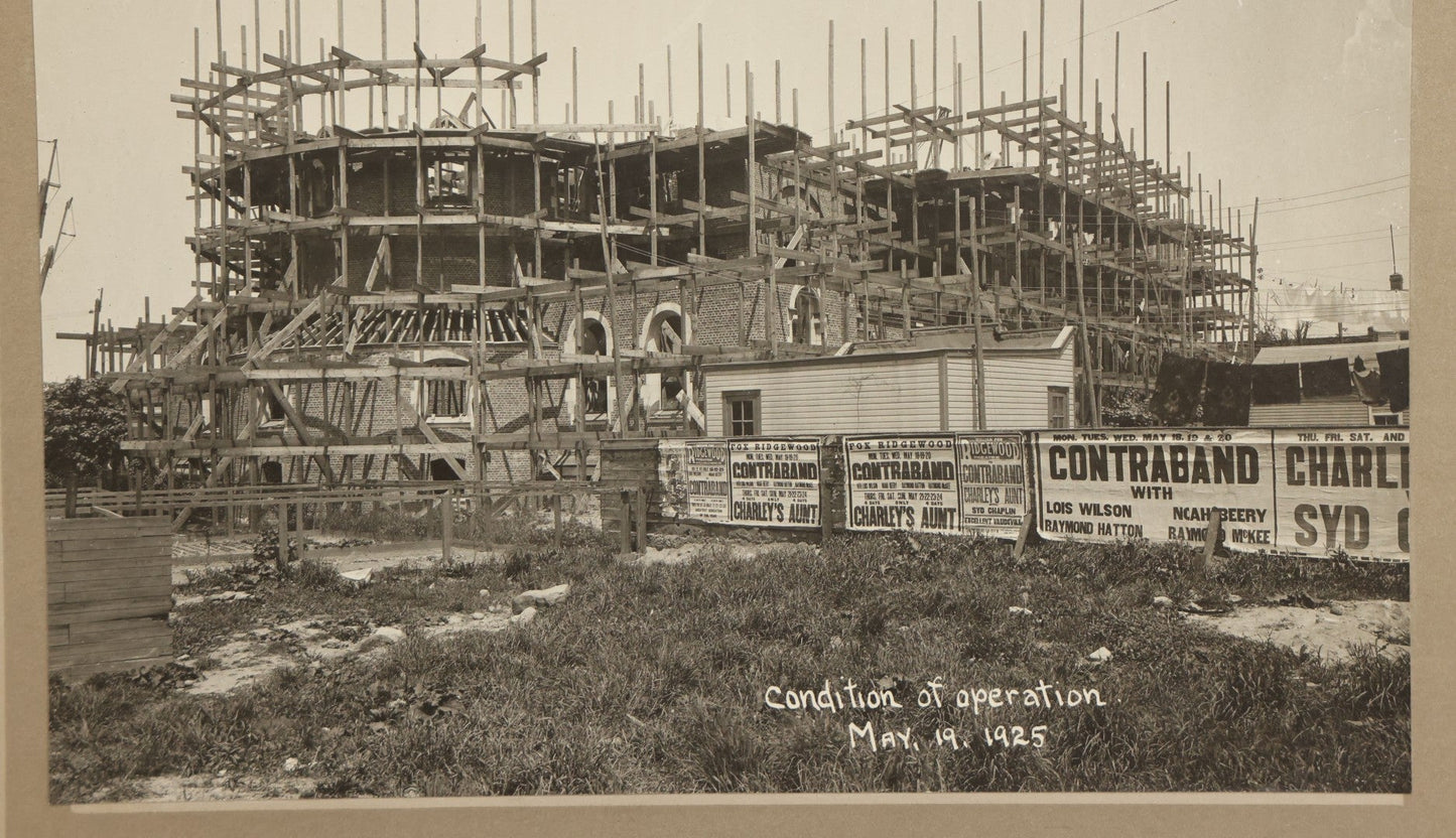 Lot 100 - Single Antique Boarded Photo Depicting A Building Under Construction, Possibly A Church In Queens, New York, With Posters Advertising The Fox Ridgewood Theater, Photo Marked "Condition Of Operations, May 19, 1925"