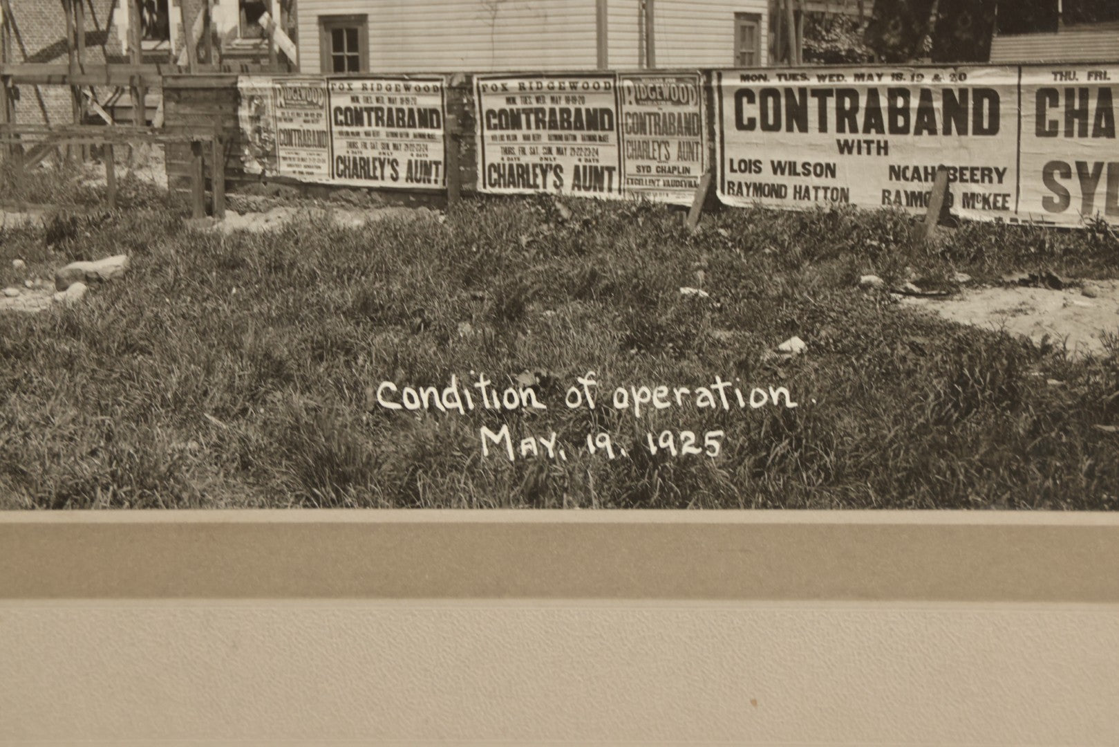 Lot 100 - Single Antique Boarded Photo Depicting A Building Under Construction, Possibly A Church In Queens, New York, With Posters Advertising The Fox Ridgewood Theater, Photo Marked "Condition Of Operations, May 19, 1925"