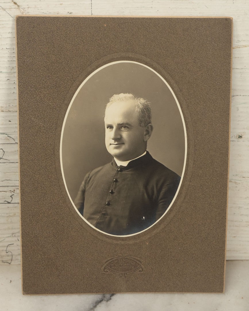 Lot 105 - Grouping Of Three Antique Photographs Including Two Priests, A Church, And A Photo Album With Assorted Snapshot Photographs