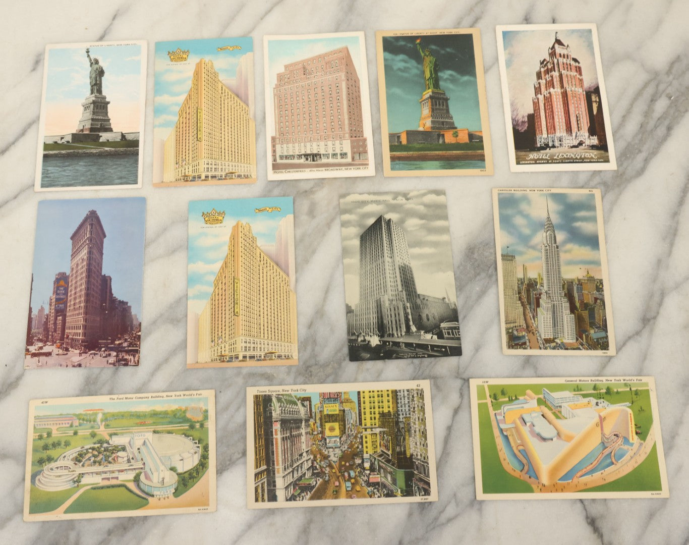 Lot 122 - Grouping Of Twelve Vintage Postcards Souvenir Postcards From New York City, New York, Including The Statue Of Liberty, Times Square, The Chrysler Building, Etc., Circa 1940s