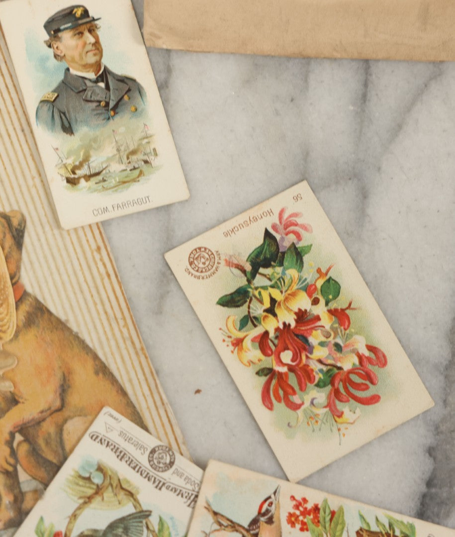 Lot 142 - Grouping Of Mixed Antique Ephemera As Found Including Early Hand Colored Winter Engraving, Friends' Reading Room Association Card, Numerous Tobacco Cards, Die Cuts, Etc., Approximately 35+ Pieces