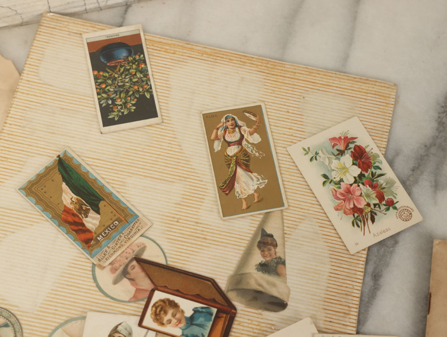 Lot 142 - Grouping Of Mixed Antique Ephemera As Found Including Early Hand Colored Winter Engraving, Friends' Reading Room Association Card, Numerous Tobacco Cards, Die Cuts, Etc., Approximately 35+ Pieces