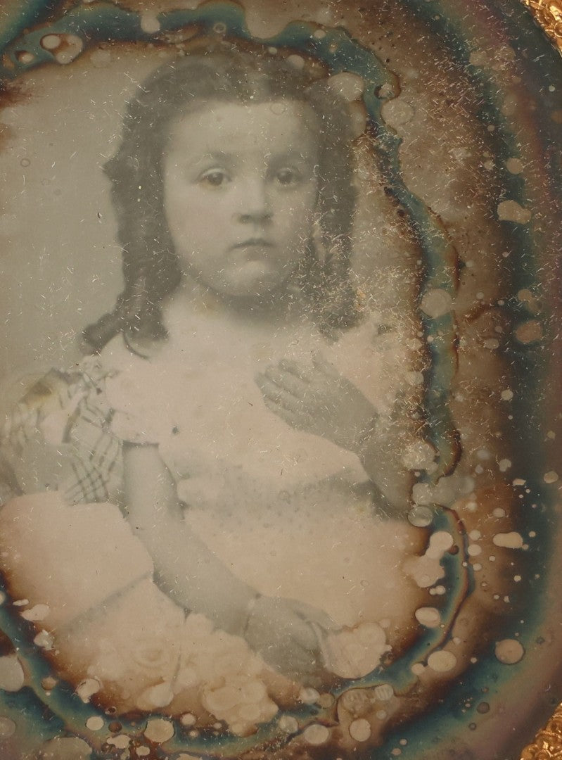 Lot 013 - Antique 1/6th Plate Daguerreotype Photograph Of A Young Girl In A White Dress Holding Her Hand To Her Chest, In Thermoplastic Case Manufactured By Hoolmes, Booth, & Haydens' Daguerreotype, Photographic, And Ambrotype Goods