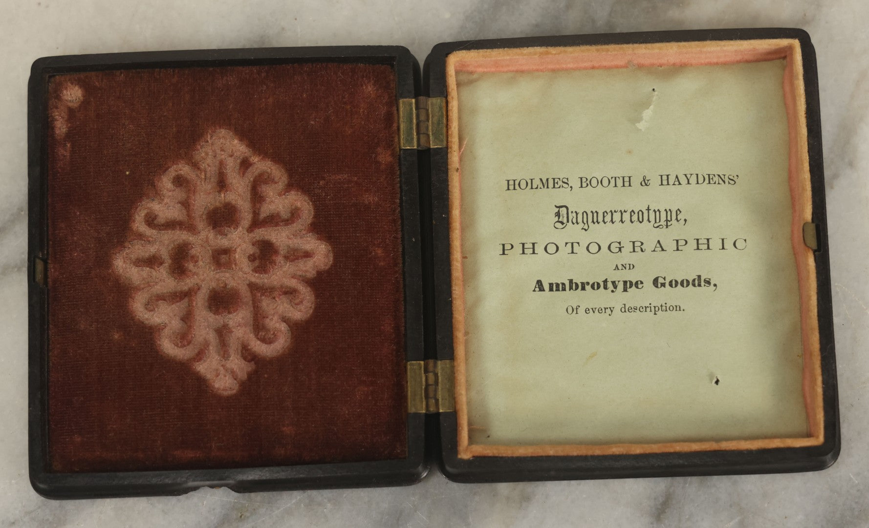 Lot 013 - Antique 1/6th Plate Daguerreotype Photograph Of A Young Girl In A White Dress Holding Her Hand To Her Chest, In Thermoplastic Case Manufactured By Hoolmes, Booth, & Haydens' Daguerreotype, Photographic, And Ambrotype Goods