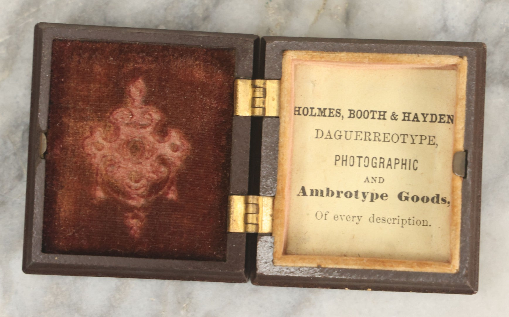 Lot 014 - Antique 1/16th Plate Ruby Ambrotype Photograph Of A Pretty Young Woman With A Long Ribbon In Her Hair In A Pictorial Thermoplastic Case Manufactured By Hoolmes, Booth, & Haydens' Daguerreotype, Photographic, And Ambrotype Goods
