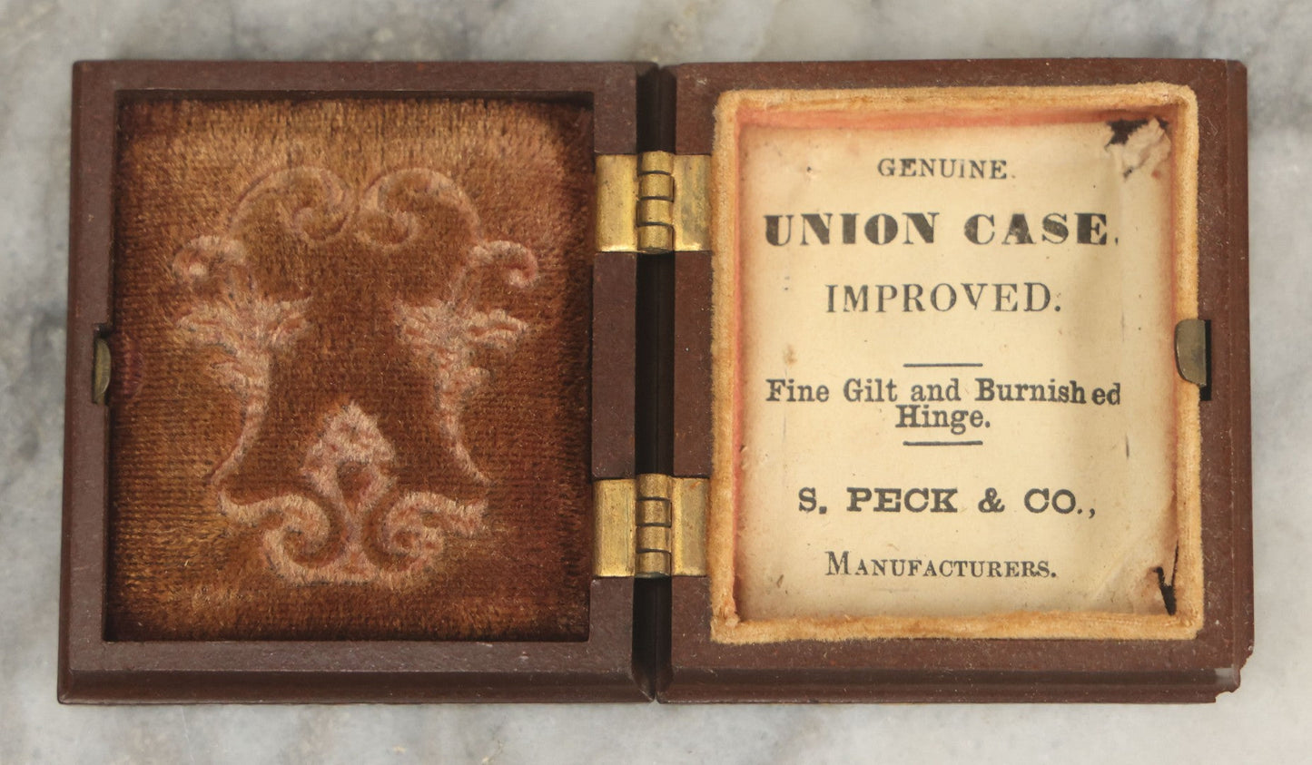 Lot 015 - Antique 1/16th Plate Ambrotype Photograph Of A Man With A 1000 Yard Stare A Comically Wide White Bowtie In A Thermoplastic Case, Genuine Union Case, Improved, Manufactured By S. Peck & Co.