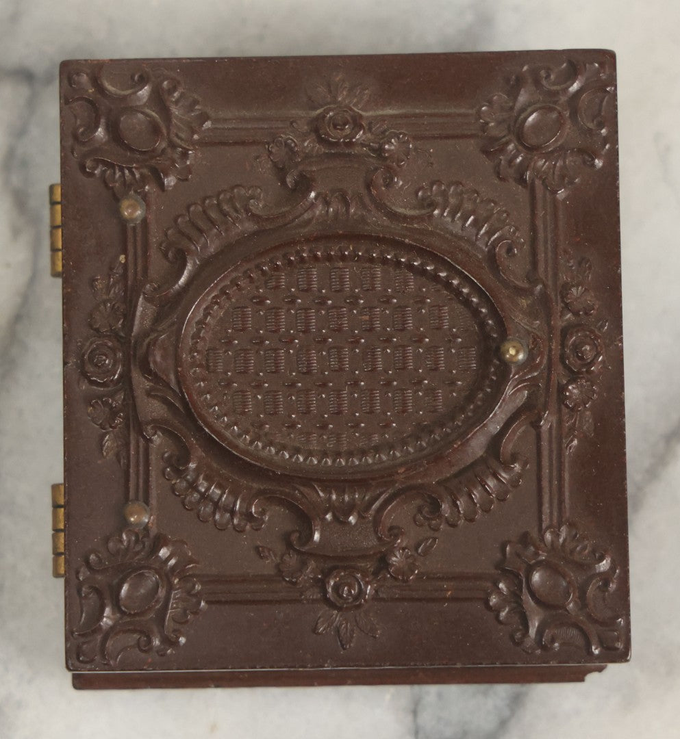 Lot 015 - Antique 1/16th Plate Ambrotype Photograph Of A Man With A 1000 Yard Stare A Comically Wide White Bowtie In A Thermoplastic Case, Genuine Union Case, Improved, Manufactured By S. Peck & Co.