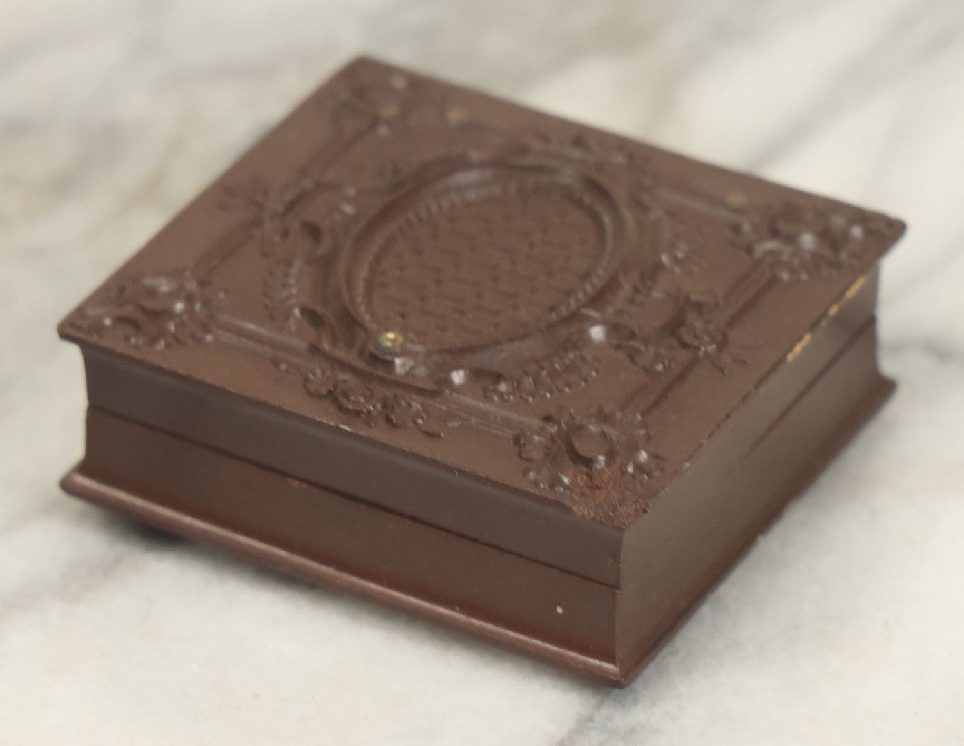 Lot 015 - Antique 1/16th Plate Ambrotype Photograph Of A Man With A 1000 Yard Stare A Comically Wide White Bowtie In A Thermoplastic Case, Genuine Union Case, Improved, Manufactured By S. Peck & Co.