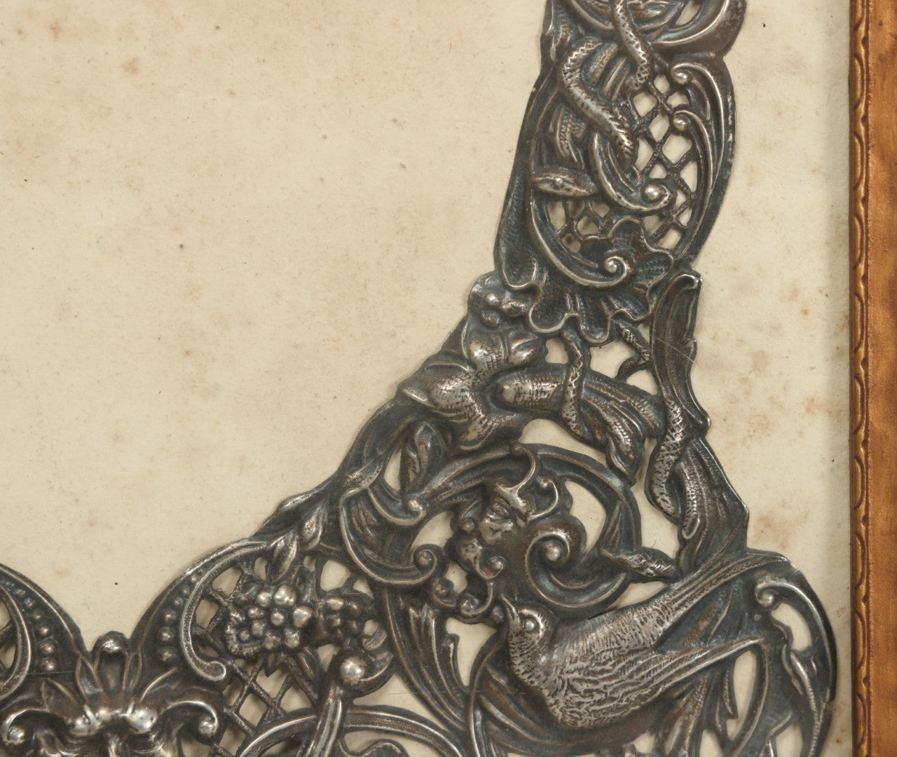 Lot 022 - Antique Sterling Silver Repoussé Gothic Revival Art Nouveau Frame Front With Numerous Green Man Motifs, Framed Behind Glass, Approximately 2.8 Troy Ounces