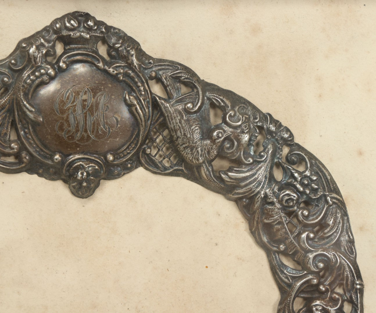 Lot 022 - Antique Sterling Silver Repoussé Gothic Revival Art Nouveau Frame Front With Numerous Green Man Motifs, Framed Behind Glass, Approximately 2.8 Troy Ounces