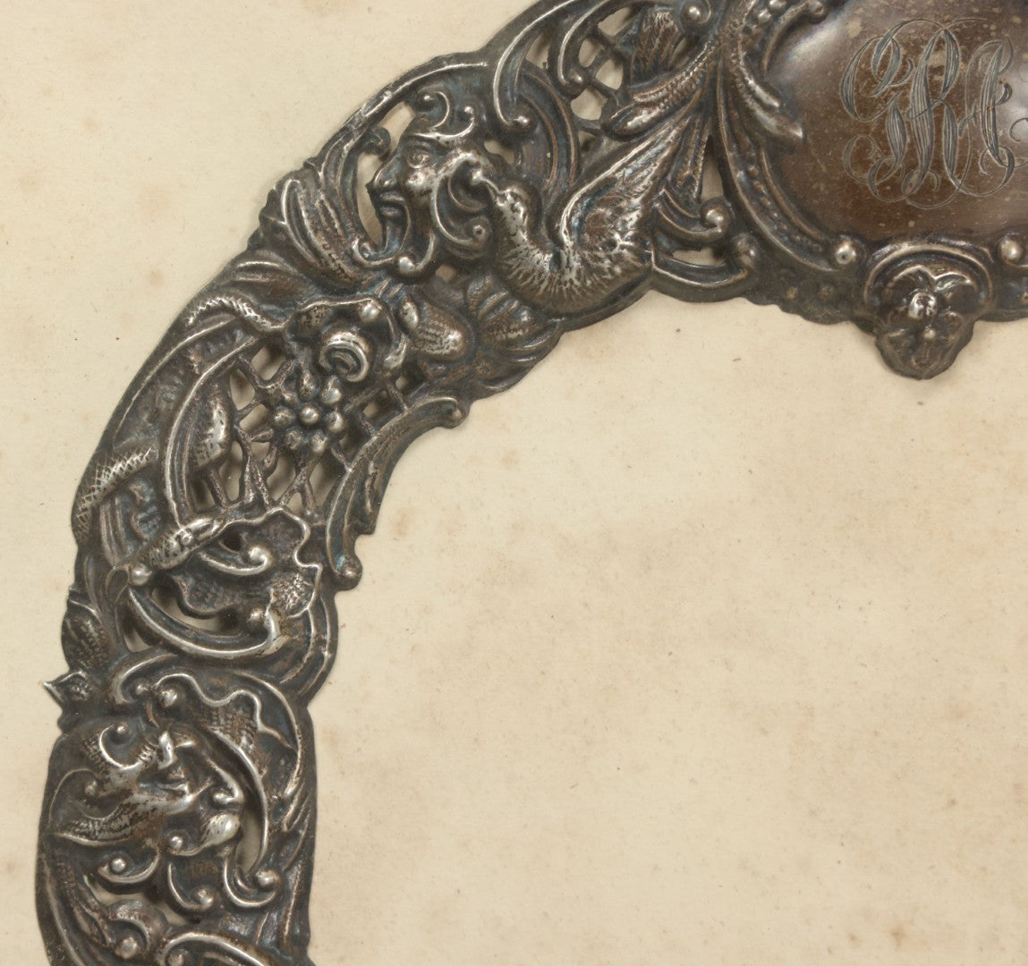 Lot 022 - Antique Sterling Silver Repoussé Gothic Revival Art Nouveau Frame Front With Numerous Green Man Motifs, Framed Behind Glass, Approximately 2.8 Troy Ounces